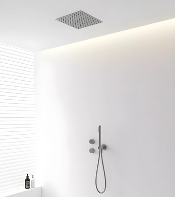 A modern matte black knurled texture shower system embedded in a white wall with a ceiling-mounted shower head and a hand-held shower below, set against a minimalist bathroom backdrop.