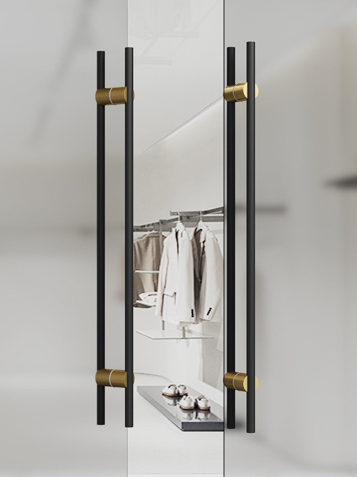 Matte black and gold entrance door handle