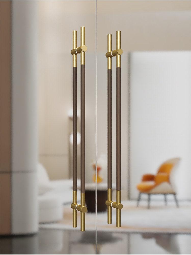 Long door push pull handle made of walnut wood and satin gold metal