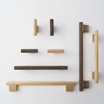 HELIOS knurled brass handles and T-pulls in Satin Brass and Antique Brass, flat lay