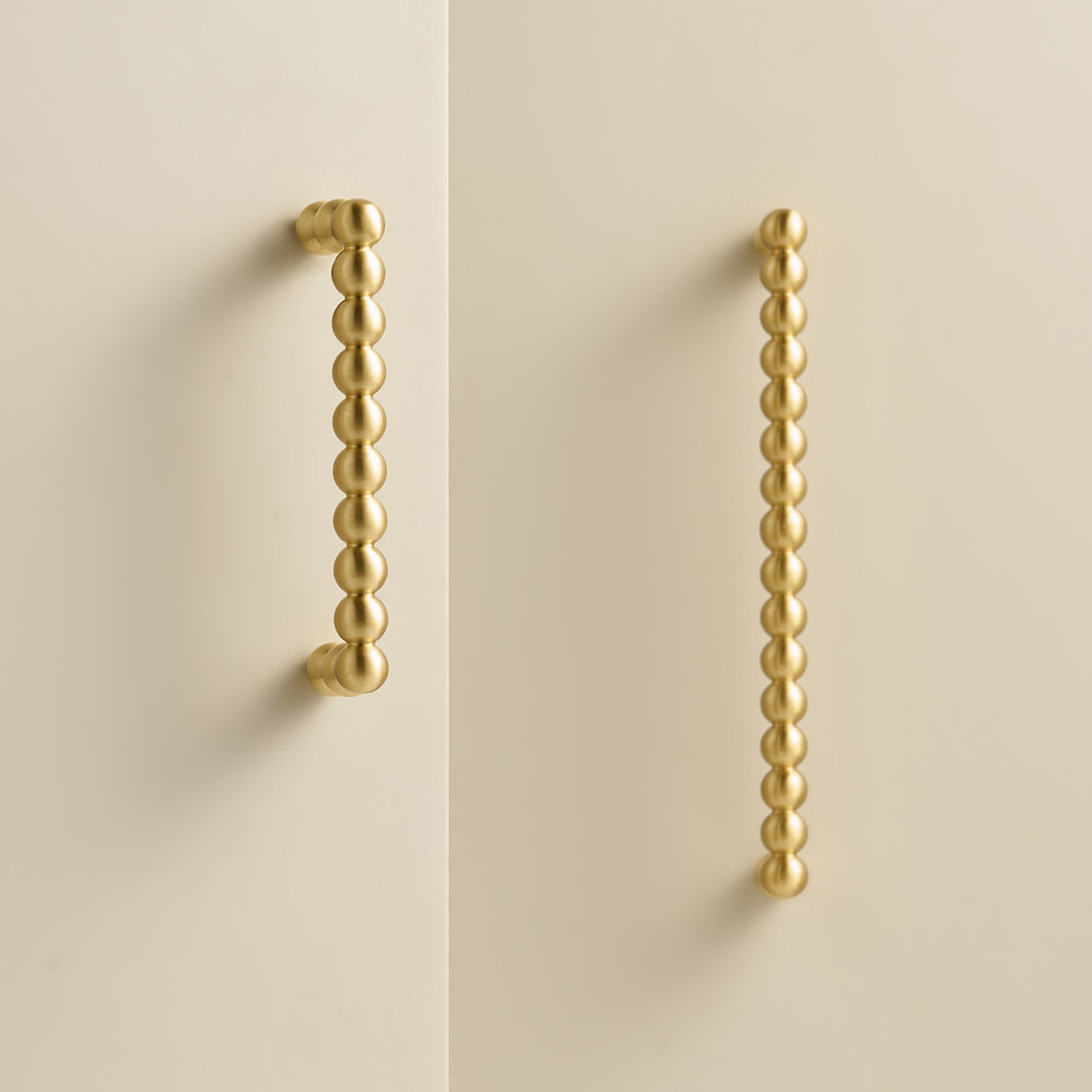 KOMBOLOI beaded brass handles and T-pulls in Satin Brass, studio scene