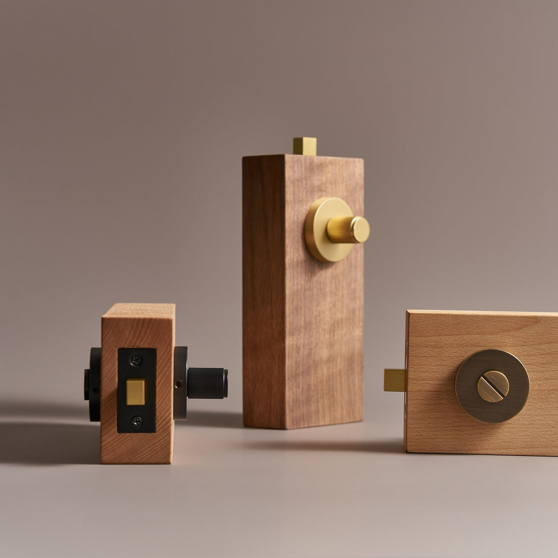 MARBELLA linear knurled brass thumbturns on wood door samples