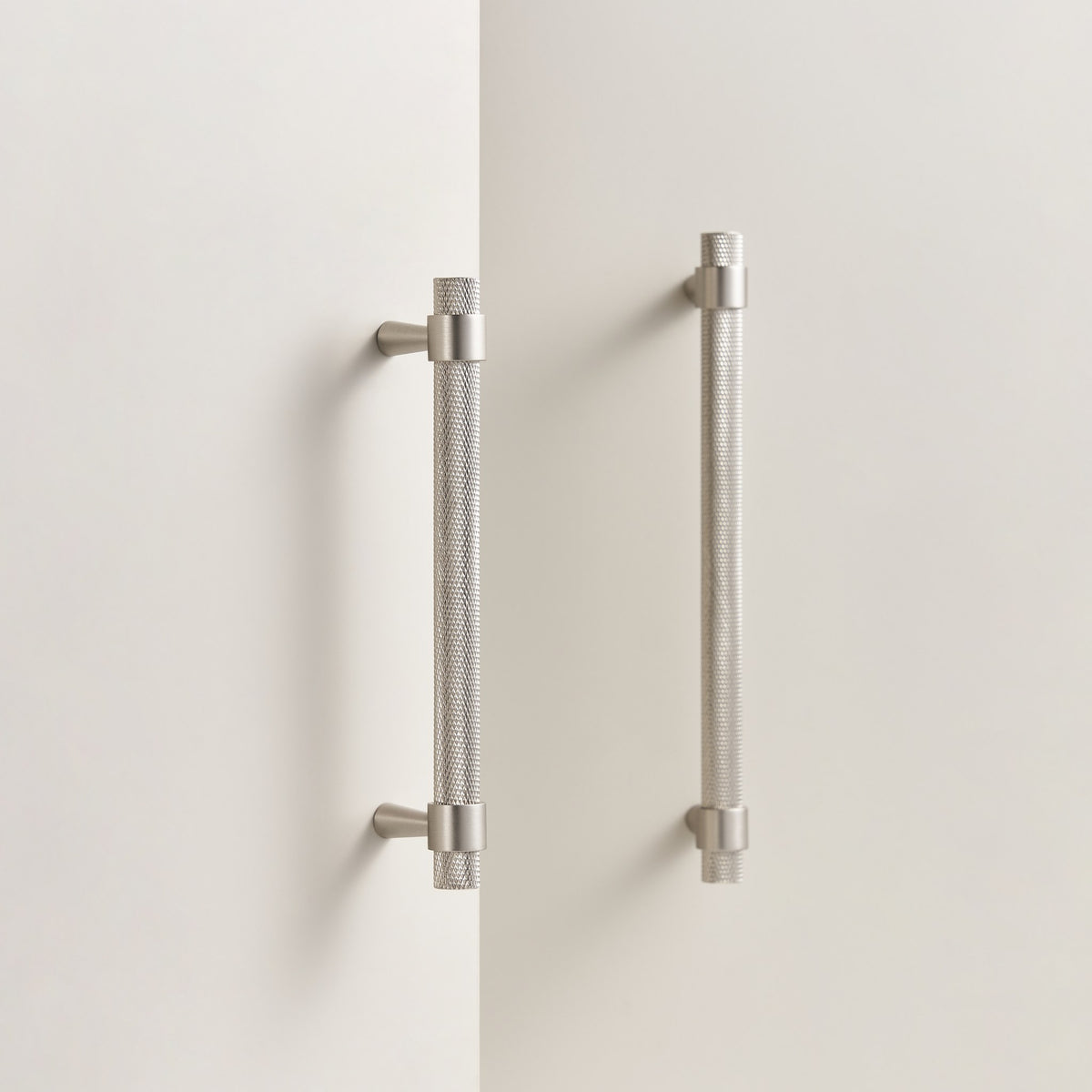 OPORTO knurled cabinet handles in Brushed Nickel on cream cabinet doors