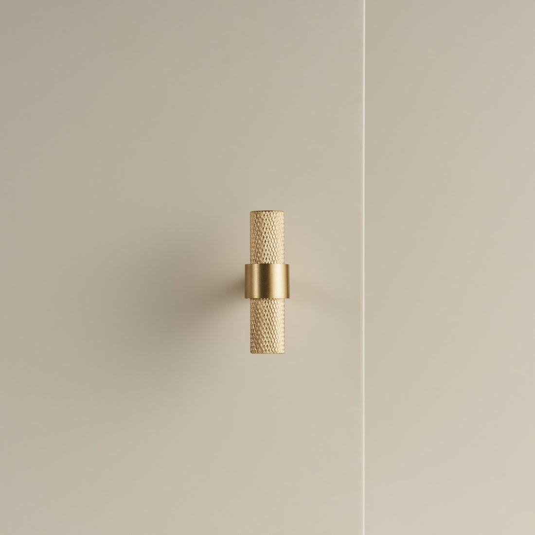 OPORTO knurled T-pulls in Satin Brass and black with brass post