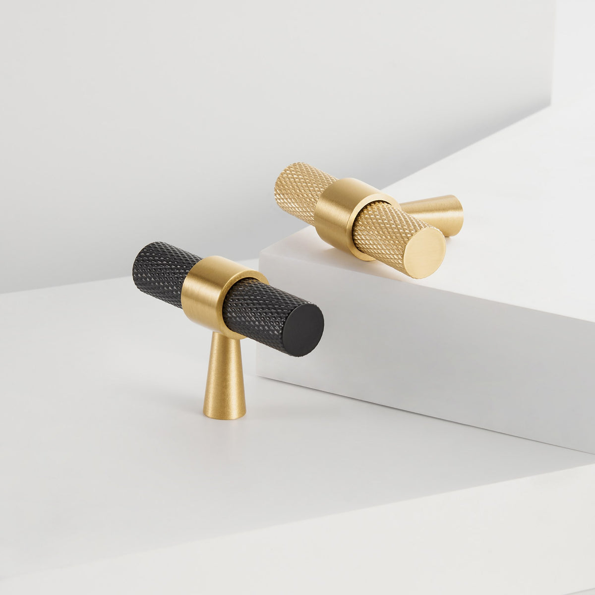 OPORTO knurled T-pulls in Satin Brass and black with brass post