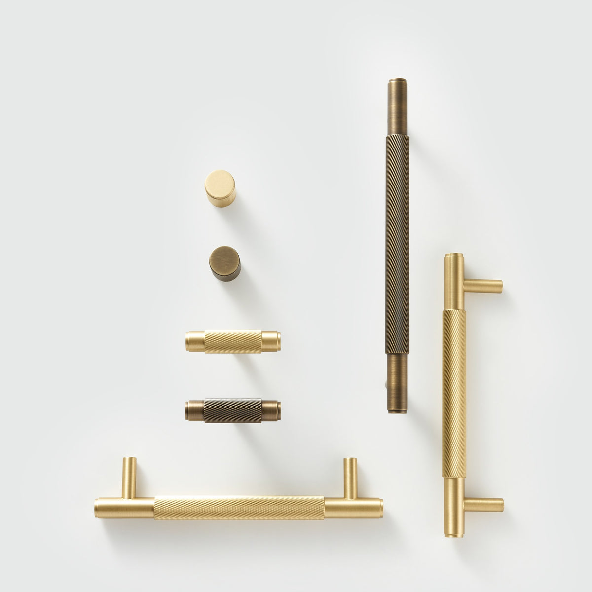 PALENCIA swirled knurl brass handles, T-pulls and knobs flat lay