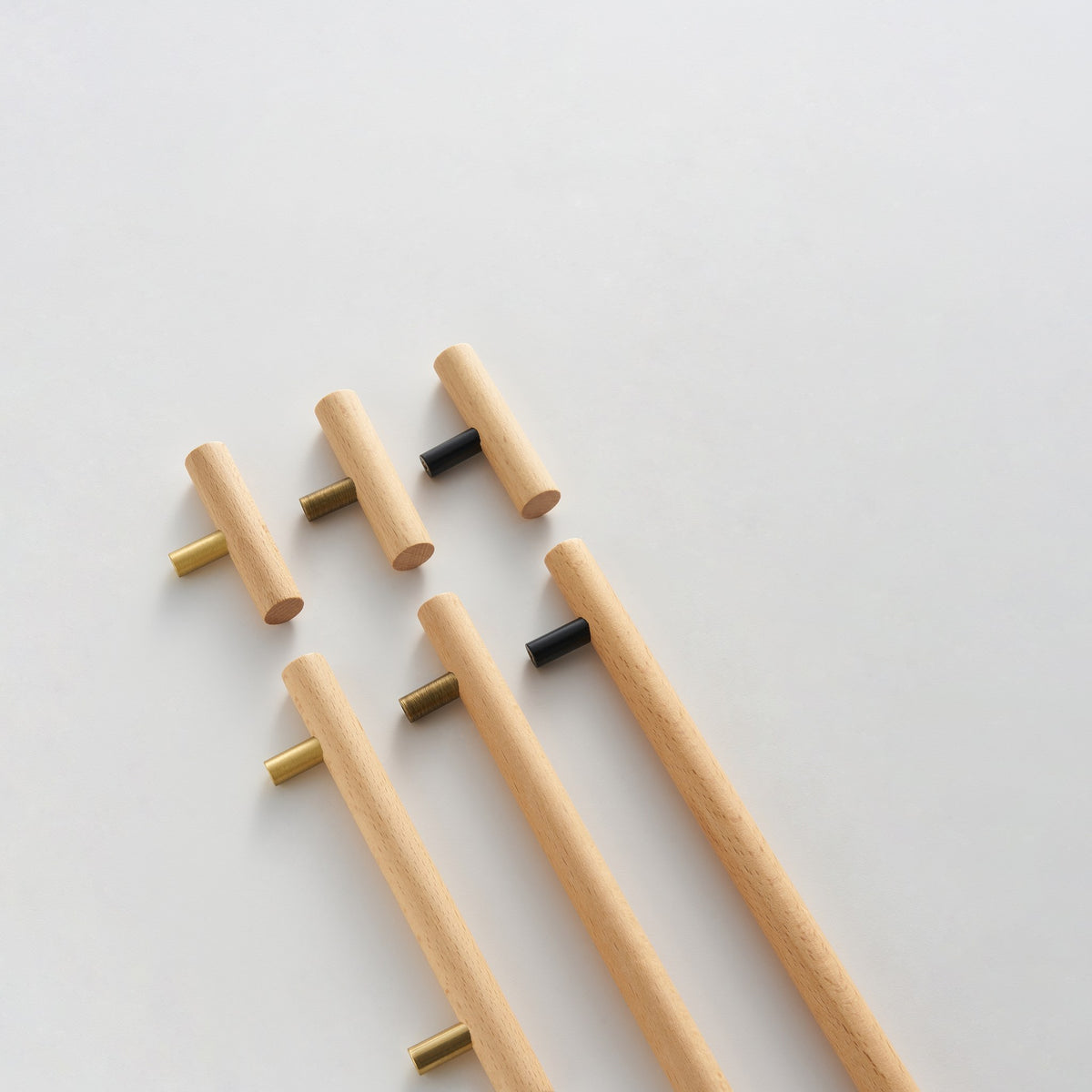 PILIO beech wood handles with Satin Brass, Antique Brass and Matte Black posts
