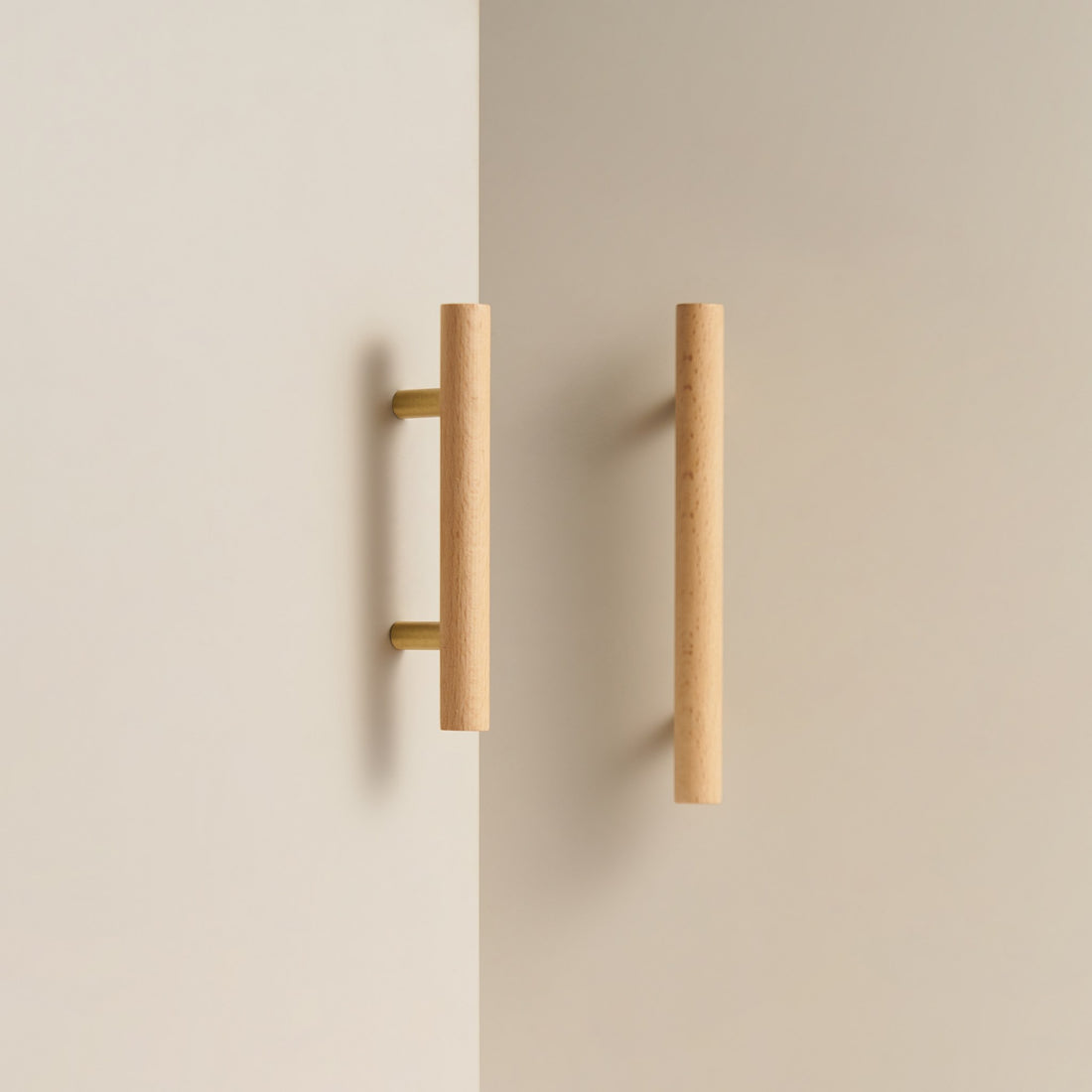 PILIO beech wood handles and T-pulls standing in a studio scene