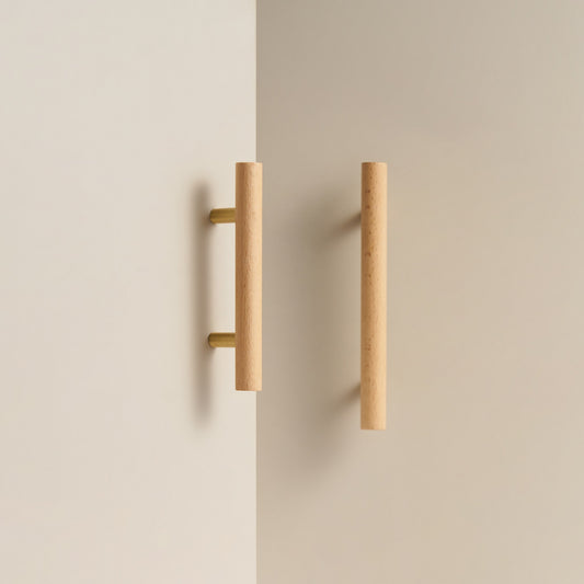 PILIO beech wood cabinet handles with Satin Brass posts on cream cabinet doors