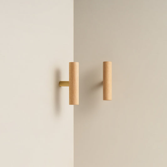 PILIO beech wood T-pull with Satin Brass post on a cabinet door