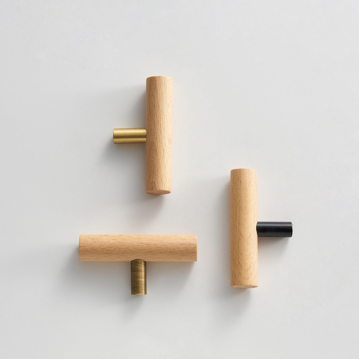 PILIO beech wood T-pulls in Satin Brass, Antique Brass and Matte Black