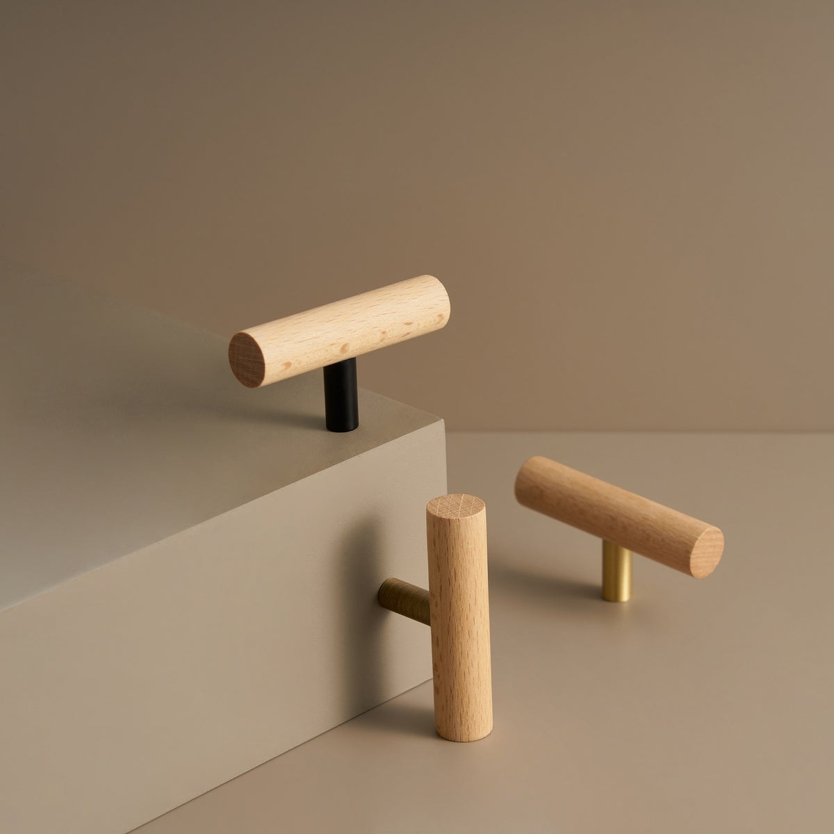 PILIO beech wood T-pulls styled on a stone step