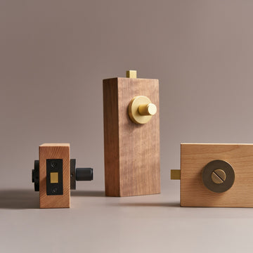 TINOS diamond knurled brass thumbturns on wood door samples